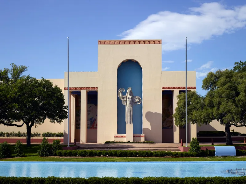 The Art Deco Centennial Hall and its reflecting pool at Fair Park
