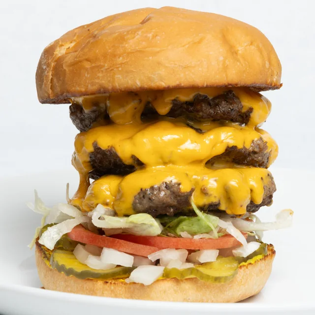 A triple cheeseburger from Hunky’s Old Fashioned Hamburgers