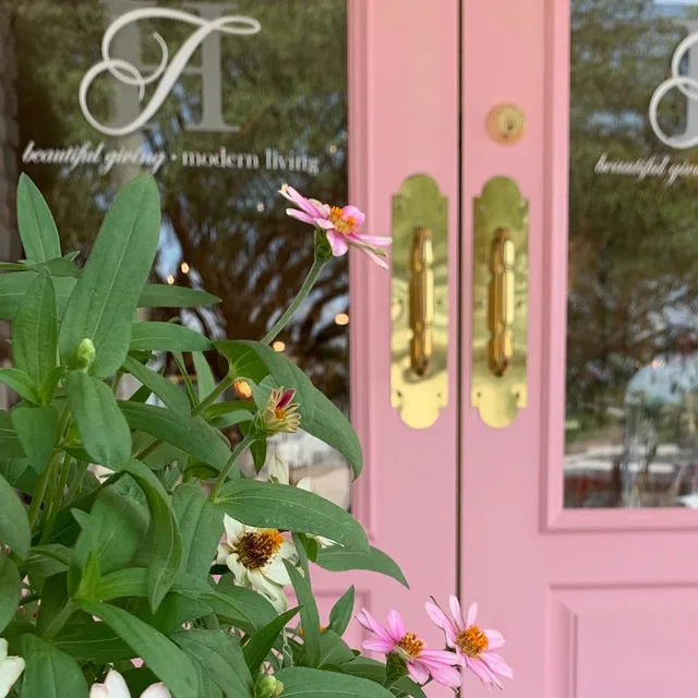 The pink front doors of Talulah & HESS