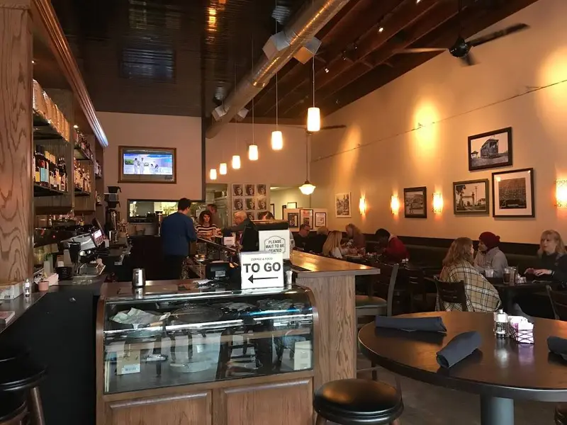 Diners at tables inside The Heights