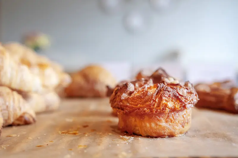 A kouign-amann and croissants at Village Baking Co.